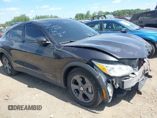 2022 Ford Mustang Mach-E Select z VIN 3FMTK1SS9NMA18394, wystawiony jako IAAI lot #40067340 z przebiegiem 35 805 mil mil oraz . Historia ofert i sprzedaży dostępna na DreamBid. Obrazek 1.