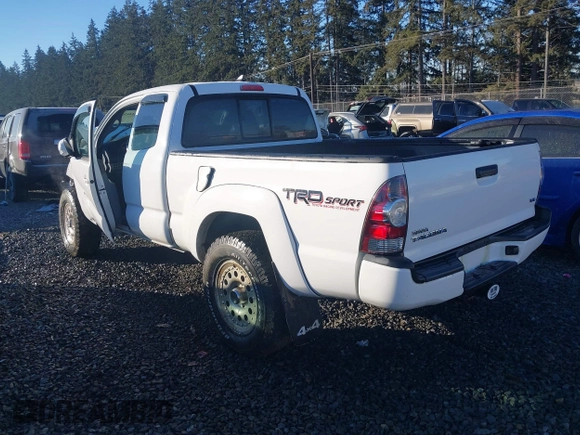 2014 Toyota Tacoma with VIN 5TFUU4EN1EX088377, listed as a IAAI auction lot 41443682 with 67,185 mi miles and . Bid and sale history available at DreamBid. Image 3.