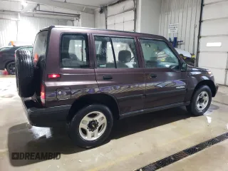 1998 Chevrolet Tracker z VIN 2CNBJ1362W6919635, wystawiony jako Copart lot #56894355 z przebiegiem 140 298 mil mil oraz Szkoda całkowita • Salvage title. Historia ofert i sprzedaży dostępna na DreamBid. Obrazek 3.