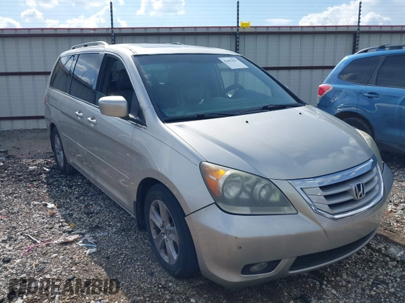 2009 Honda Odyssey Touring z VIN 5FNRL38999B052244, wystawiony jako IAAI lot #42085003 z przebiegiem 269 402 mil mil oraz . Historia ofert i sprzedaży dostępna na DreamBid. Obrazek 1.