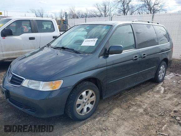 2003 Honda Odyssey EX-L with VIN 5FNRL18903B090800, listed as a IAAI auction lot 41843858 with 201,393 mi miles and . Bid and sale history available at DreamBid. Image 2.