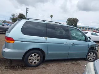 2004 Honda Odyssey EX-L with VIN 5FNRL18064B060817, listed as a IAAI auction lot 42032796 with 200,999 mi miles and . Bid and sale history available at DreamBid. Image 14.
