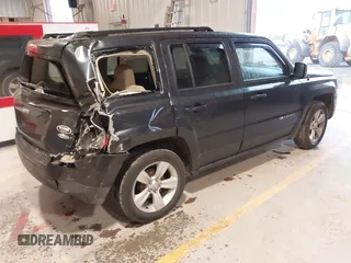 2014 Jeep Patriot Latitude with VIN 1C4NJPFA0ED633657, listed as a IAAI auction lot 41447982 with 104,664 mi miles and . Bid and sale history available at carsss.com. Image 4.