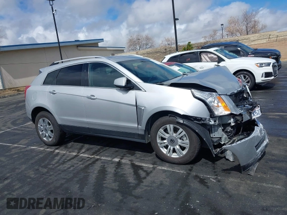 2016 Cadillac SRX Luxury Collection z VIN 3GYFNBE38GS520891, wystawiony jako IAAI lot #41781445 z przebiegiem 52 202 mil mil oraz . Historia ofert i sprzedaży dostępna na DreamBid. Obrazek 14.