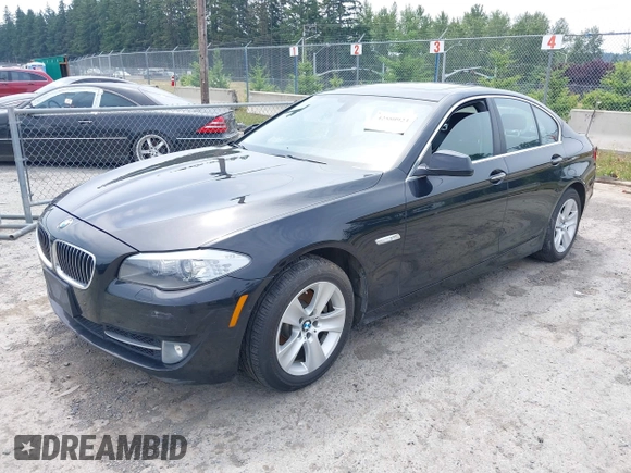 2013 BMW 5 Series 528i xDrive with VIN WBAXH5C59DDW14522, listed as a IAAI auction lot 42580923 with 106,400 mi miles and . Bid and sale history available at DreamBid. Image 2.