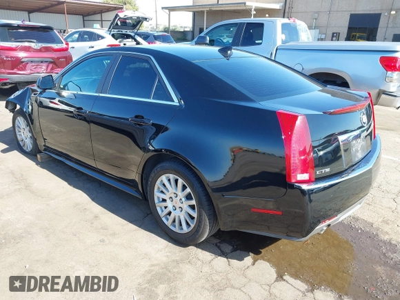 2013 Cadillac CTS Luxury with VIN 1G6DE5E51D0165634, listed as a IAAI auction lot 42208023 with 92,827 mi miles and . Bid and sale history available at DreamBid. Image 3.