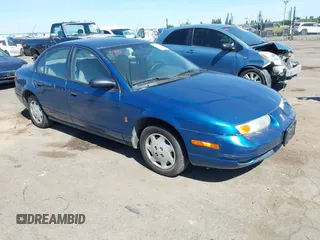 2002 Saturn SL z VIN 1G8ZG52842Z232340, wystawiony jako IAAI lot #42266758 z przebiegiem 204 135 mil mil oraz . Historia ofert i sprzedaży dostępna na DreamBid. Obrazek 1.