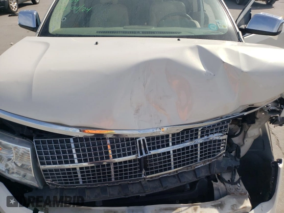 2007 Lincoln MKX z VIN 2LMDU68C27BJ22858, wystawiony jako Copart lot #54777825 z przebiegiem 147 548 mil mil oraz Szkoda całkowita • Salvage title. Historia ofert i sprzedaży dostępna na DreamBid. Obrazek 12.