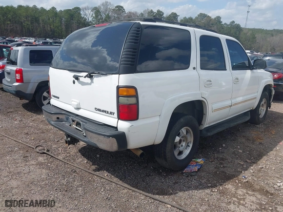 2004 Chevrolet Tahoe LT with VIN 1GNEC13Z44R192822, listed as a IAAI auction lot 41797924 with 211,818 mi miles. Bid and sale history available at carsss.com. Image 4.