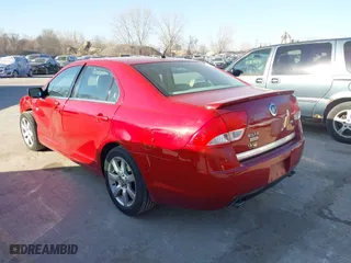 2010 Mercury Milan Premier with VIN 3MEHM0JG9AR631302, listed as a IAAI auction lot 41759973 with 112,018 mi miles. Bid and sale history available at carsss.com. Image 3.
