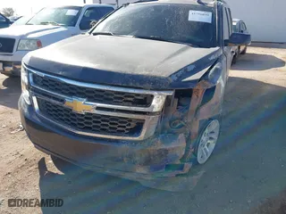 2015 Chevrolet Suburban LT with VIN 1GNSKJKCXFR701284, listed as a IAAI auction lot 41756059 with 1 mi miles. Bid and sale history available at carsss.com. Image 6.