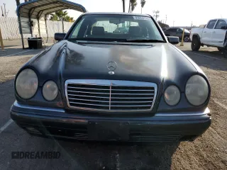1997 Mercedes-Benz E 320 with VIN WDBJF55FXVA430115, listed as a Copart auction lot 43053715 with 158,057 mi miles and Clean Title. Bid and sale history available at DreamBid. Image 5.