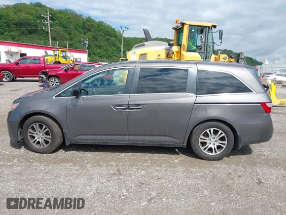 2012 Honda Odyssey EX-L with VIN 5FNRL5H68CB060487, listed as a IAAI auction lot 42176223 with 234,078 mi miles and . Bid and sale history available at DreamBid. Image 15.