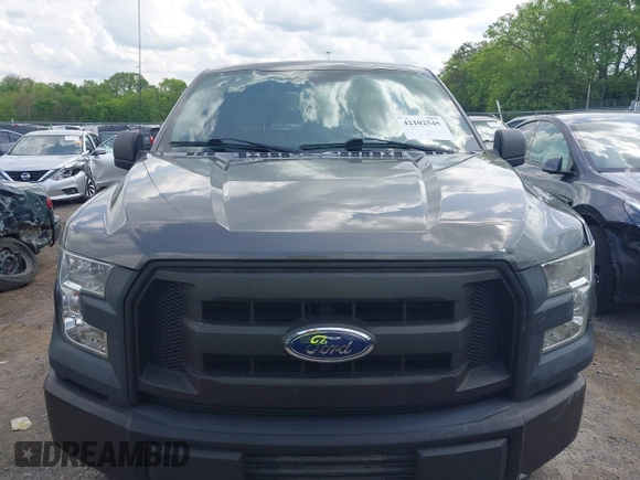 2015 Ford F-150 XLT with VIN 1FTEX1E89FKD84587, listed as a IAAI auction lot 42102545 with 141,265 mi miles. Bid and sale history available at carsss.com. Image 12.