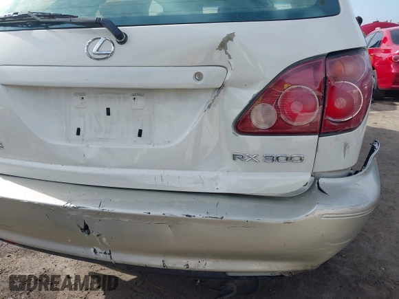 2000 Lexus RX 300 z VIN JT6HF10U8Y0098868, wystawiony jako IAAI lot #41878449 z przebiegiem 162 170 mil mil oraz . Historia ofert i sprzedaży dostępna na DreamBid. Obrazek 17.