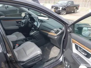 2019 Honda CR-V Touring with VIN 2HKRW2H9XKH636354, listed as a IAAI auction lot 41902615 with 66,781 mi miles and . Bid and sale history available at DreamBid. Image 5.