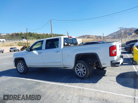 2014 GMC Sierra 1500 Denali z VIN 3GTU2WEJ2EG349289, wystawiony jako IAAI lot #41313698 z przebiegiem 190 441 mil mil oraz . Historia ofert i sprzedaży dostępna na DreamBid. Obrazek 14.