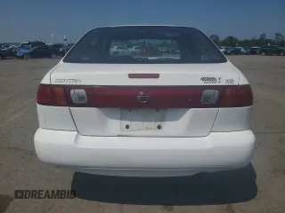 1999 Nissan Sentra XE with VIN 1N4AB41D2XC700091, listed as a Copart auction lot 59734435 with 53,658 mi miles and Salvage title. Bid and sale history available at DreamBid. Image 6.
