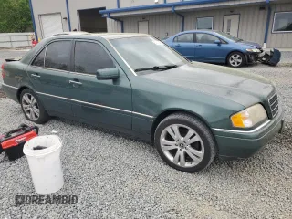 1995 Mercedes-Benz C 230/260/280/320 with VIN WDBHA28E3SF241951, listed as a Copart auction lot 50332845 with 236,068 mi miles and Salvage title. Bid and sale history available at DreamBid. Image 4.