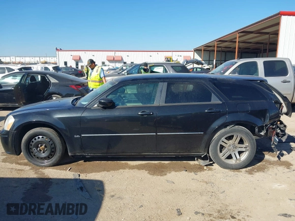2005 Dodge Magnum SE with VIN 2D4FV48V55H661046, listed as a IAAI auction lot 41644364 with 125,400 mi miles and . Bid and sale history available at carsss.com. Image 14.