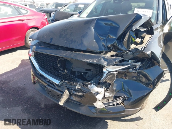 2017 Mazda CX-5 Touring with VIN JM3KFACL2H0146213, listed as a IAAI auction lot 41626112 with 77,829 mi miles and . Bid and sale history available at carsss.com. Image 6.