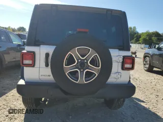 2022 Jeep Wrangler Unlimited High Tide with VIN 1C4HJXDG9NW132131, listed as a Copart auction lot 69314354 with 33,711 mi miles and Salvage Title. Bid and sale history available at DreamBid. Image 6.