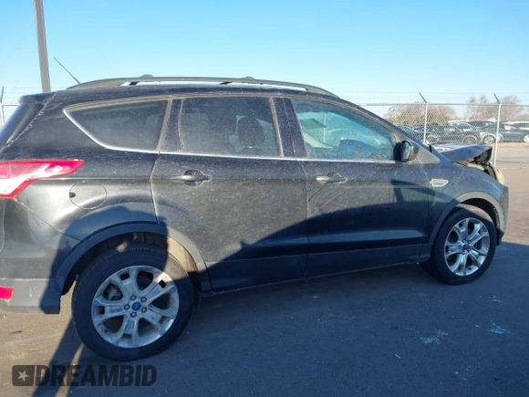 2013 Ford Escape SE with VIN 1FMCU9GX2DUC24504, listed as a IAAI auction lot 41846714 with 145,333 mi miles. Bid and sale history available at carsss.com. Image 13.