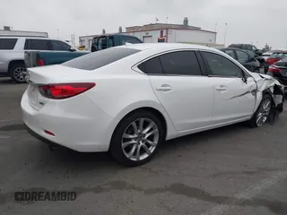 2016 Mazda Mazda6 i Touring with VIN JM1GJ1V52G1468807, listed as a IAAI auction lot 41888686 with 121,764 mi miles. Bid and sale history available at carsss.com. Image 4.