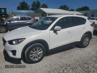 2016 Mazda CX-5 Touring z VIN JM3KE2CY1G0624866, wystawiony jako Copart lot #58738715 z przebiegiem 137 917 mil mil oraz Czysty tytuł • Clean title. Historia ofert i sprzedaży dostępna na DreamBid. Obrazek 1.