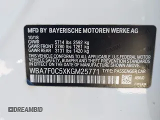 2019 BMW 7 Series 750i with VIN WBA7F0C5XKGM25771, listed as a IAAI auction lot 42167614 with 73,692 mi miles. Bid and sale history available at carsss.com. Image 9.