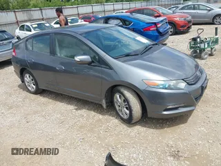 2010 Honda Insight EX with VIN JHMZE2H71AS008487, listed as a IAAI auction lot 42533409 with 95,765 mi miles and . Bid and sale history available at DreamBid. Image 1.