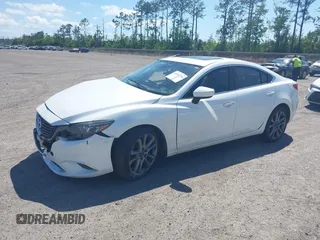 2016 Mazda Mazda6 i Grand Touring with VIN JM1GJ1W55G1443186, listed as a IAAI auction lot 42063716 with 114,263 mi miles. Bid and sale history available at carsss.com. Image 17.