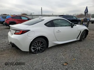 2023 Toyota GR86 with VIN JF1ZNBC17P8761781, listed as a Copart auction lot 80765984 with 8,717 mi miles and Salvage Title. Bid and sale history available at carsss.com. Image 3.