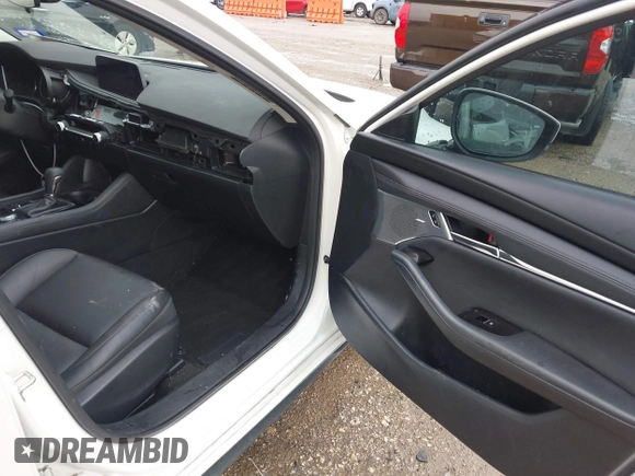 2023 Mazda 3 S Premium with VIN 3MZBPBDM6PM371326, listed as a IAAI auction lot 42138373 with 24,865 mi miles and . Bid and sale history available at DreamBid. Image 5.