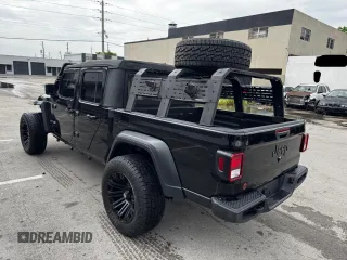 2024 Jeep Gladiator Sport S with VIN 1C6HJTAG2RL132886, listed as a Copart auction lot 63946735 with 6,111 mi miles and Clean title. Bid and sale history available at DreamBid. Image 3.