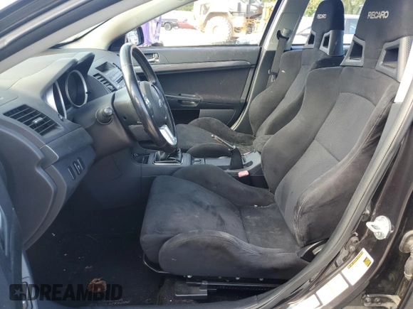 2011 Mitsubishi Lancer Evolution GSR with VIN JA32W8FV6BU010292, listed as a Copart auction lot 68446384 with 0 mi miles and Salvage Title. Bid and sale history available at carsss.com. Image 7.