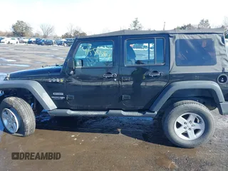 2018 Jeep Wrangler JK Unlimited Sport with VIN 1C4BJWDG3JL829130, listed as a IAAI auction lot 41554884 with 109,745 mi miles. Bid and sale history available at carsss.com. Image 14.