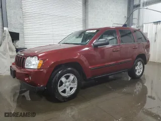 2007 Jeep Grand Cherokee Laredo with VIN 1J8GR48K27C687033, listed as a Copart auction lot 52401165 with 135,146 mi miles and Salvage Title. Bid and sale history available at carsss.com. Image 1.