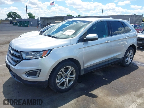 2015 Ford Edge Titanium z VIN 2FMTK4K95FBB47962, wystawiony jako IAAI lot #42234894 z przebiegiem Nie podano mil oraz . Historia ofert i sprzedaży dostępna na DreamBid. Obrazek 17.