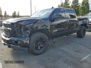 2017 Chevrolet Silverado 1500 LTZ with VIN 3GCUKSECXHG440566, listed as a Copart auction lot 51677165 with 140,659 mi miles and Salvage Title. Bid and sale history available at DreamBid. Image 1.