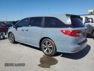 2024 Honda Odyssey Touring with VIN 5FNRL6H84RB001517, listed as a Copart auction lot 48306655 with 60,757 mi miles and Salvage Title. Bid and sale history available at carsss.com. Image 2.
