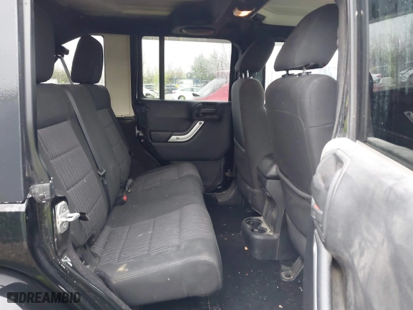 2011 Jeep Wrangler Unlimited Sahara with VIN 1J4BA5H12BL548870, listed as a IAAI auction lot 42010303 with 139,693 mi miles. Bid and sale history available at carsss.com. Image 8.