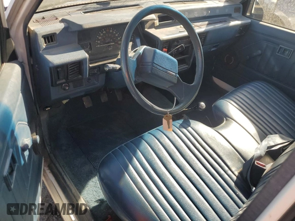 1990 Mitsubishi Mighty Max z VIN JA7FL24W3LP007688, wystawiony jako Copart lot #42651005 z przebiegiem 265 379 mil mil oraz Tytuł czysty. Historia ofert i sprzedaży dostępna na DreamBid. Obrazek 8.