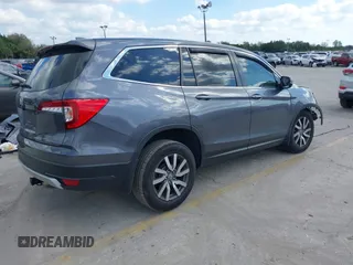 2020 Honda Pilot EX-L with VIN 5FNYF5H59LB014497, listed as a IAAI auction lot 41527415 with 66,625 mi miles. Bid and sale history available at carsss.com. Image 4.