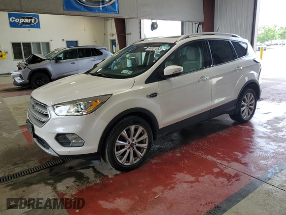 2018 Ford Escape Titanium с VIN 1FMCU9J90JUB30658, выставлен на аукционе Copart как лот 64001665 с пробегом 61 970 миль миль и Списание • Salvage title. История ставок и продаж доступна на DreamBid. Изображение 1.