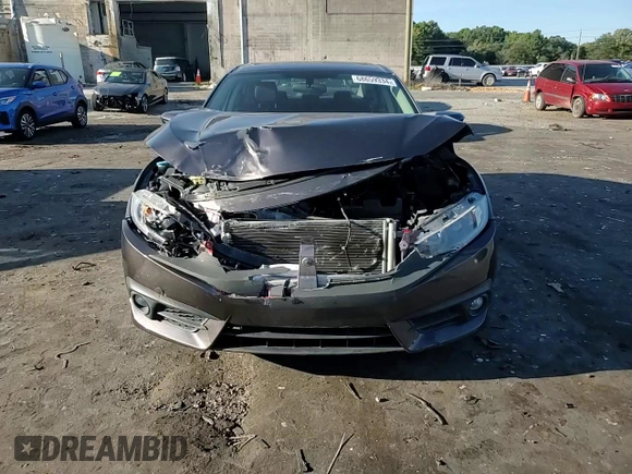 2016 Honda Civic EX-T z VIN 2HGFC1F36GH635272, wystawiony jako Copart lot #68659334 z przebiegiem 74 175 mil mil oraz Szkoda całkowita • Salvage title. Historia ofert i sprzedaży dostępna na DreamBid. Obrazek 11.