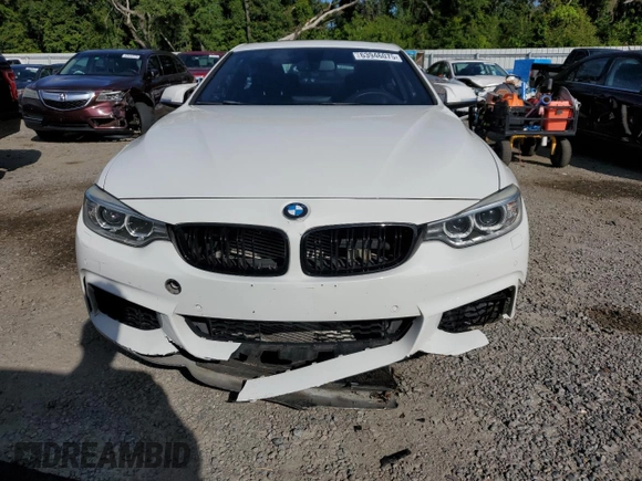 2014 BMW 4 Series 435i xDrive with VIN WBA3R5C59EK187836, listed as a Copart auction lot 63946075 with 100,700 mi miles and Salvage title. Bid and sale history available at DreamBid. Image 5.
