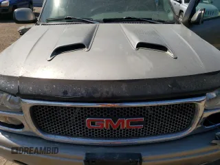 2003 GMC Sierra Denali z VIN 2GTFK69U831158334, wystawiony jako Copart lot #66320714 z przebiegiem Nie podano mil oraz Szkody całkowita. Historia ofert i sprzedaży dostępna na DreamBid. Obrazek 11.
