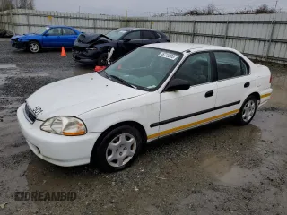 1998 Honda Civic z VIN 1HGEN1644WL000132, wystawiony jako Copart lot #46713085 z przebiegiem 21 566 mil mil oraz Czysty tytuł • Clean title. Historia ofert i sprzedaży dostępna na DreamBid. Obrazek 1.
