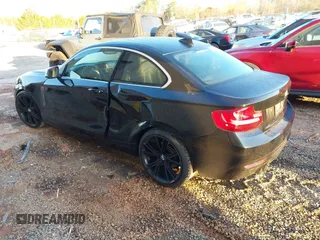2015 BMW 2 Series 228i with VIN WBA1F5C55FV256604, listed as a IAAI auction lot 41841754 with 118,354 mi miles. Bid and sale history available at carsss.com. Image 3.